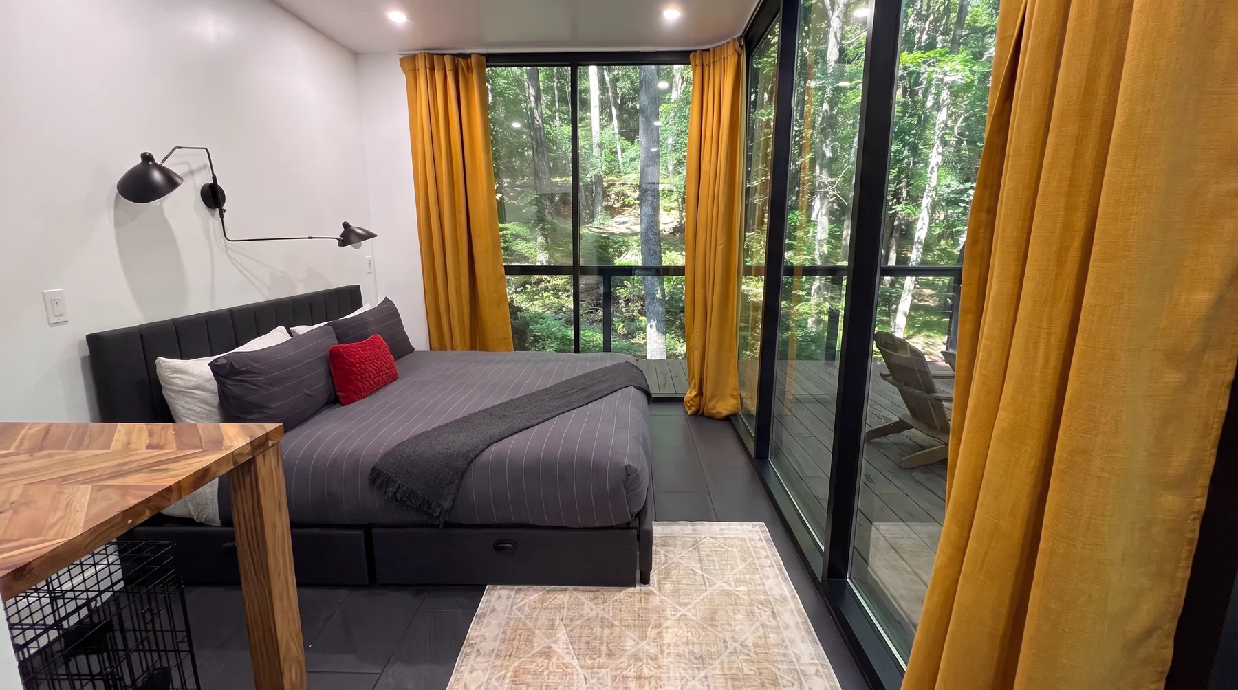 After cleaning: the same bedroom with the bed made and floor cleared
